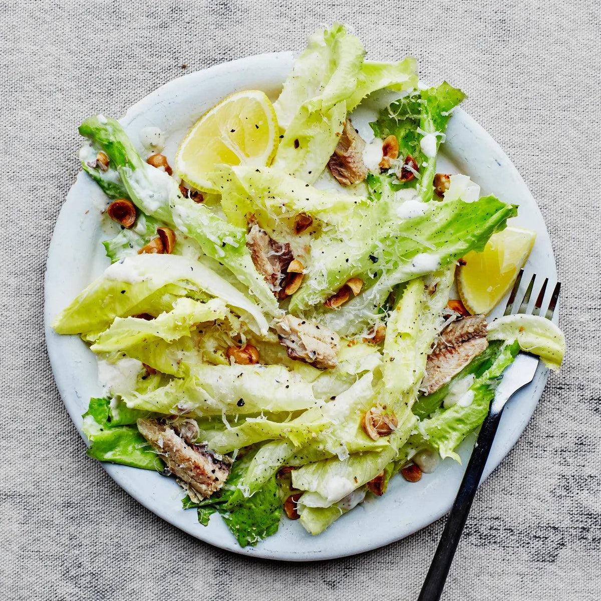Caesar salad with sardines